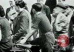 Image of French civilians listen to German propaganda broadcast Paris France, 1940, second 20 stock footage video 65675072694