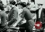 Image of French civilians listen to German propaganda broadcast Paris France, 1940, second 21 stock footage video 65675072694