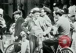 Image of French civilians listen to German propaganda broadcast Paris France, 1940, second 23 stock footage video 65675072694