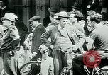 Image of French civilians listen to German propaganda broadcast Paris France, 1940, second 24 stock footage video 65675072694