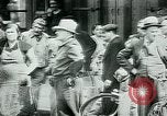 Image of French civilians listen to German propaganda broadcast Paris France, 1940, second 25 stock footage video 65675072694