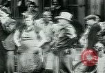 Image of French civilians listen to German propaganda broadcast Paris France, 1940, second 26 stock footage video 65675072694