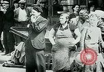 Image of French civilians listen to German propaganda broadcast Paris France, 1940, second 29 stock footage video 65675072694