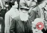 Image of French civilians listen to German propaganda broadcast Paris France, 1940, second 36 stock footage video 65675072694