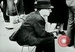 Image of French civilians listen to German propaganda broadcast Paris France, 1940, second 39 stock footage video 65675072694