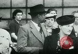 Image of French civilians listen to German propaganda broadcast Paris France, 1940, second 44 stock footage video 65675072694