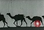 Image of Camels in Muslim lands of  Eurasia and Africa Middle East, 1936, second 61 stock footage video 65675072698