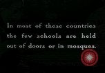 Image of Madrassa Islamic school outside a mosque Middle East, 1936, second 1 stock footage video 65675072701