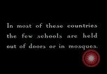 Image of Madrassa Islamic school outside a mosque Middle East, 1936, second 4 stock footage video 65675072701