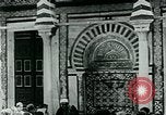 Image of Madrassa Islamic school outside a mosque Middle East, 1936, second 10 stock footage video 65675072701