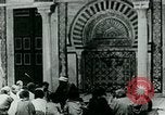 Image of Madrassa Islamic school outside a mosque Middle East, 1936, second 12 stock footage video 65675072701
