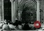 Image of Madrassa Islamic school outside a mosque Middle East, 1936, second 13 stock footage video 65675072701