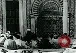 Image of Madrassa Islamic school outside a mosque Middle East, 1936, second 14 stock footage video 65675072701