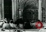 Image of Madrassa Islamic school outside a mosque Middle East, 1936, second 16 stock footage video 65675072701