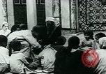 Image of Madrassa Islamic school outside a mosque Middle East, 1936, second 19 stock footage video 65675072701