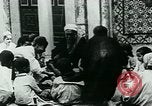 Image of Madrassa Islamic school outside a mosque Middle East, 1936, second 20 stock footage video 65675072701