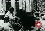 Image of Madrassa Islamic school outside a mosque Middle East, 1936, second 21 stock footage video 65675072701