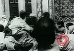 Image of Madrassa Islamic school outside a mosque Middle East, 1936, second 22 stock footage video 65675072701