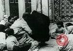 Image of Madrassa Islamic school outside a mosque Middle East, 1936, second 23 stock footage video 65675072701
