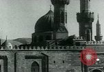 Image of Madrassa Islamic school outside a mosque Middle East, 1936, second 39 stock footage video 65675072701
