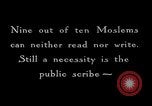 Image of Madrassa Islamic school outside a mosque Middle East, 1936, second 45 stock footage video 65675072701