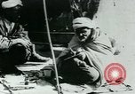 Image of Madrassa Islamic school outside a mosque Middle East, 1936, second 56 stock footage video 65675072701