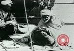 Image of Madrassa Islamic school outside a mosque Middle East, 1936, second 61 stock footage video 65675072701