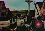Image of German farmers work aroung a crashed U.S. Air Force P-47 in a field Germany, 1945, second 37 stock footage video 65675072706