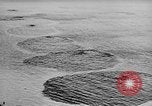 Image of fire wall off English coast to prevent German invasion United Kingdom, 1945, second 9 stock footage video 65675072721