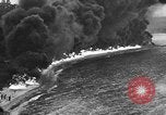 Image of fire wall off English coast to prevent German invasion United Kingdom, 1945, second 49 stock footage video 65675072721