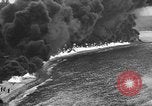 Image of fire wall off English coast to prevent German invasion United Kingdom, 1945, second 50 stock footage video 65675072721