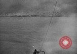 Standbild alliierten Truppen erobern Balikpapan Borneo Indonesien, 1945, aus Sekunde 56 historischem Filmmaterial Videoclip 65675072727
