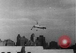 Image of Autogyro delivers mail to top of Post Office building United States USA, 1935, second 9 stock footage video 65675072921