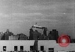 Image of Autogyro delivers mail to top of Post Office building United States USA, 1935, second 10 stock footage video 65675072921