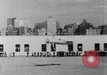 Image of Autogyro delivers mail to top of Post Office building United States USA, 1935, second 13 stock footage video 65675072921