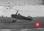 Image of Autogiro lands and takes off at a seaport United States USA, 1934, second 1 stock footage video 65675072923