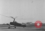 Image of Autogiro lands and takes off at a seaport United States USA, 1934, second 5 stock footage video 65675072923