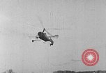 Image of Autogiro lands and takes off at a seaport United States USA, 1934, second 8 stock footage video 65675072923
