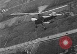 Image of Autogiro lands and takes off at a seaport United States USA, 1934, second 14 stock footage video 65675072923