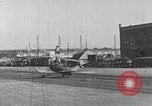 Image of Autogiro lands and takes off at a seaport United States USA, 1934, second 19 stock footage video 65675072923