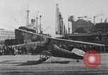 Image of Autogiro lands and takes off at a seaport United States USA, 1934, second 20 stock footage video 65675072923