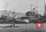 Image of Autogiro lands and takes off at a seaport United States USA, 1934, second 22 stock footage video 65675072923