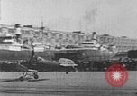 Image of Autogiro lands and takes off at a seaport United States USA, 1934, second 23 stock footage video 65675072923