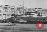 Image of Autogiro lands and takes off at a seaport United States USA, 1934, second 24 stock footage video 65675072923