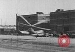 Image of Autogiro lands and takes off at a seaport United States USA, 1934, second 26 stock footage video 65675072923
