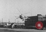 Image of Autogiro lands and takes off at a seaport United States USA, 1934, second 27 stock footage video 65675072923