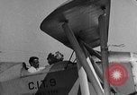 Image of biplane landing United States USA, 1928, second 22 stock footage video 65675072950