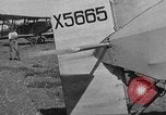 Image of biplane landing United States USA, 1928, second 25 stock footage video 65675072950