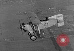 Image of biplane landing United States USA, 1928, second 39 stock footage video 65675072950