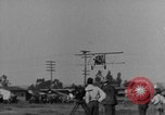 Image of biplane landing United States USA, 1928, second 51 stock footage video 65675072950